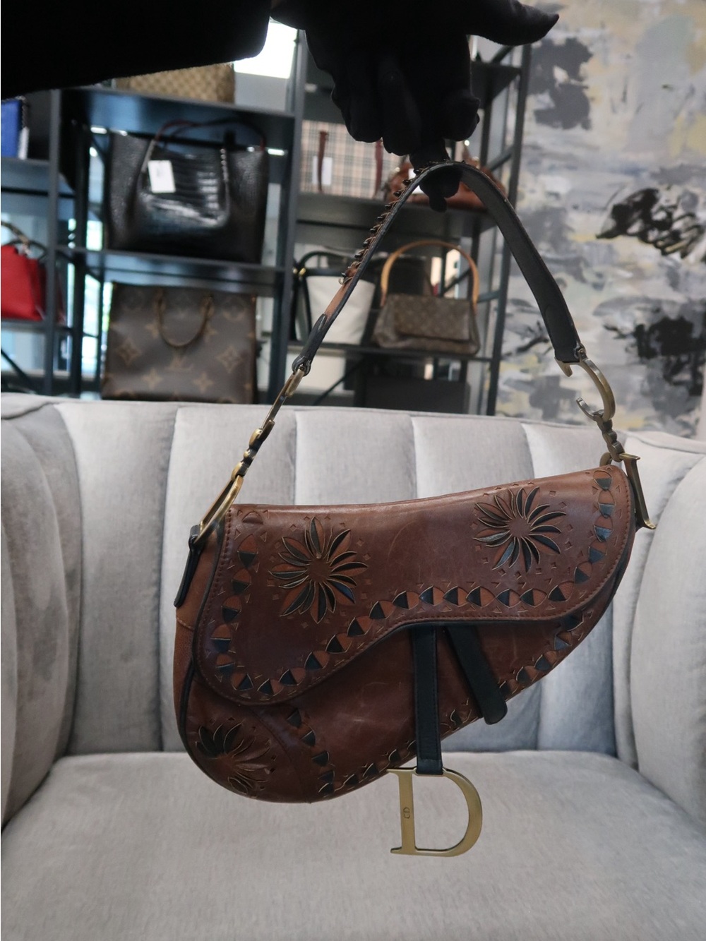 ❌SOLD❌Dior Brown Leather Saddle Bag with Floral Cutwork and Gold 'D' Charm